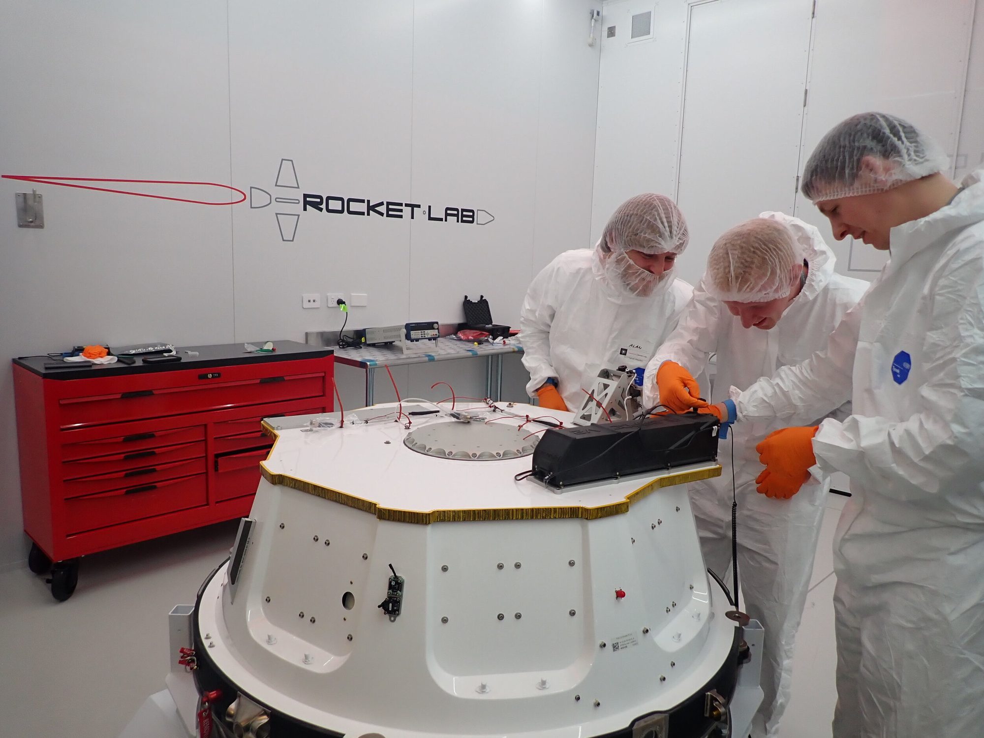 Engineers integrating an Albapod deployer in the clean room